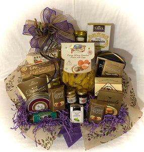Take Me to Tuscany... A big taste of Italy in this beautifully put-together gourmet basket. This basket has something for everyone! One of our Realtor's Favorites! Perfect for family, and all who love Italian food! Perfect for family gifts, or gifts for all occasions. In this reusable basket, we've included Italian Focaccia Crisps, Tira Mi Su Wafers, Breadsticks, Bruschetta Crisps, Italian Semolina Pasta, Butter Pretzels, Caramel Popcorn, Olives, Jam & Mustard, 