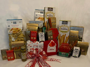 "Pasta Amore... Let's Dine In!" What’s more romantic than sharing and eating sweet and savory treats with the one you love? This large Italian dinner gift basket is filled with a host of the most delicious Italian specialty gifts we have artfully arranged for you. Included: Large 5qt. Stainless Steel Colander or gift basket, Two Regular Size Decorative Kitchen Towels, Artisan Gourmet Tagliatelle Pasta, Italian Herb Breadsticks, Chocolate Hazelnut Pirouline Wafers, Brie Cheese Spread & so much more...