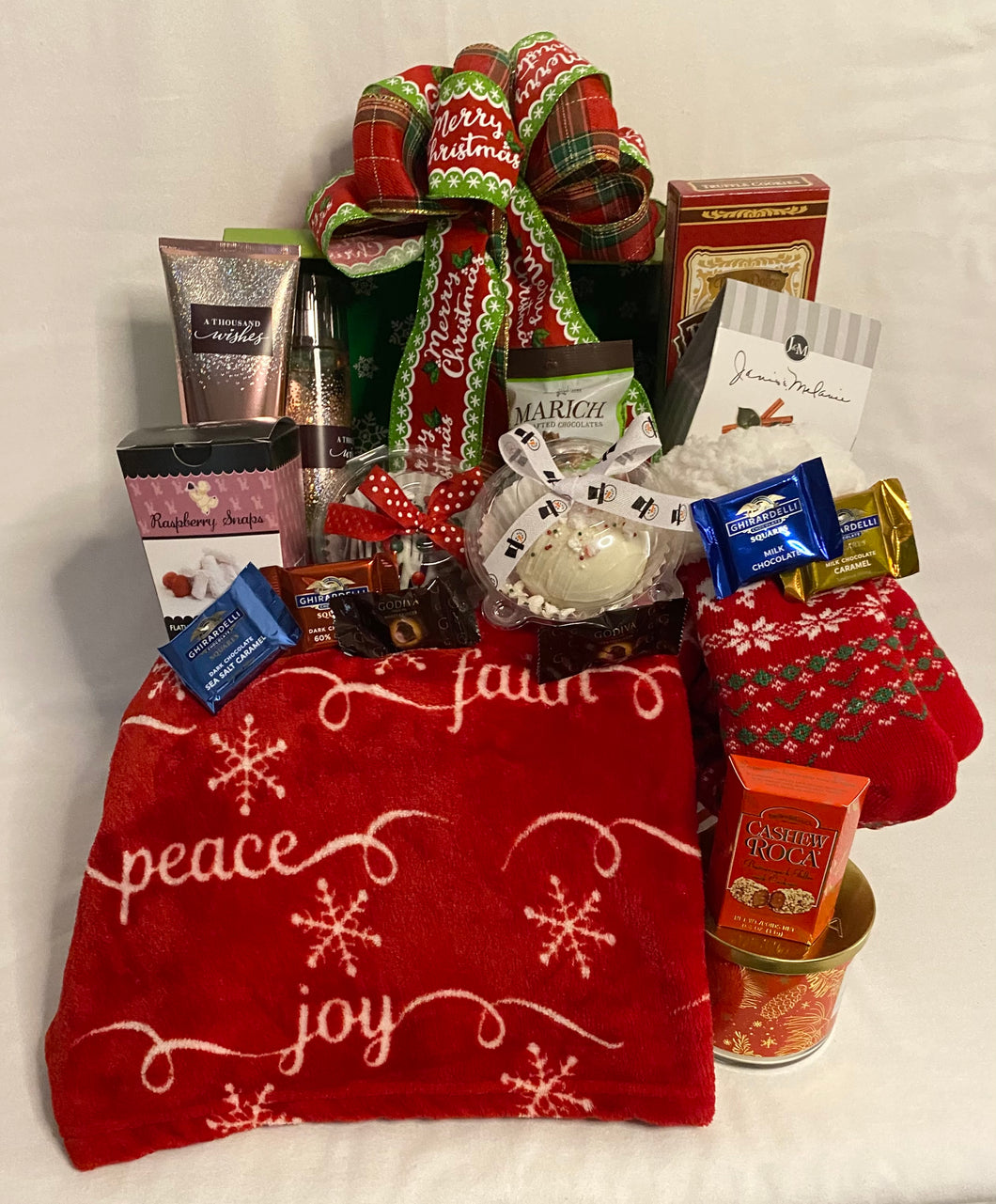 Our Christmas Holiday Trunk is a gift overloaded with special treats for yourself or that special someone! Your gift will be over the top in this beautiful trunk filled with these comforting and cozy treats. The trunk is a perfect gift in itself to store many different things.