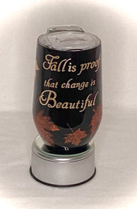 "Fall is Proof that change is Beautiful" is a 14-ounce stemless wine tumbler with a lid. It is beautifully decorated for those who love autumn and vibrant colors. The saying says it all! This tumbler is decorated with three different colors of extra fine glitter, it's a leaf peek-a-boo, and epoxy sealed. We can personalize and design these tumblers any way you like. We can add monograms, names, sayings, etc. We can design by color, size, and your preference of personalization. These cups take 1-2 weeks.