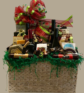 Housed within an elegantly spacious and reusable basket, this masterpiece features a rich variety of cheeses, focaccia crisps, wine and cheese biscuits, water crackers, butter pretzels, chocolate truffle cookies, candied peanuts, fruit medley, cookie rolled wafers, toffee pretzels, caramel popcorn, chocolate-covered almonds, a variety of cookies, mustard, jam, olives, caramels, and an abundance of other delectable treasures, elevating the gifting experience to new heights.