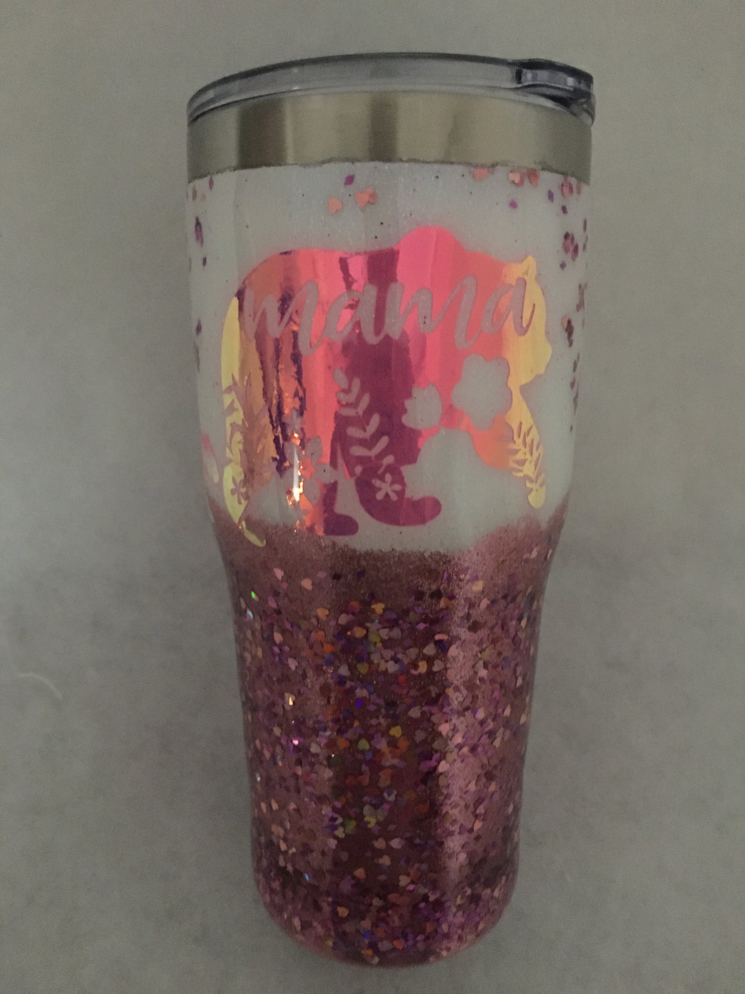 Mama Tumbler is a Perfect gift for a New mom, Adopting mom, a New baby, a baby shower, mom to be, or for that special mama. We also make these for our fur baby mommas. We can custom design with baby bears, and photos and customize for a Nana as well. This stainless tumbler is great for any hot or cold drink and can hold 30 fluid ounces and comes with a lid. It is decorated with vinyl, glitter, and resin. These tumblers can be ready in one to two weeks. Please select a different color in the dropdown.