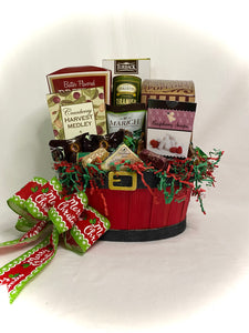 Our adorable Santa Belly Basket is the cutest basket filled with delicious treats for all. It has a perfect mix of sweet and savory treats to share around a fire, while entertaining, or just to say you are thought of! This cute belly basket contains Italian Herb Breadsticks, Butter Flavored Pretzels, Caramel Popcorn, Tiramisu Rolled Wafers, Cranberry Harvest Medley, Meat Stick, Cheese Spread, Chocolate Covered Almonds, Cookies, a variety of Chocolates, and so much more! 