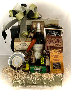 This gift isn't just for travelers; it's for anyone with a heart that loves deliciousness. Let's take a peek at what's hidden in these flip-top magic boxes: Tuscan Crisps, Gourmet Cheese Spread, Artisan Cheese Straws, Butter Flavored Pretzels, a Meat Stick, Chocolate Covered Almonds, Chocolate Cookies, a Cheese Knife, a Variety of Chocolates that are a chocolate symphony, and the pièce de résistance—an optional Bottle of Wine (red or white) to make your taste buds tango like they're in Spain